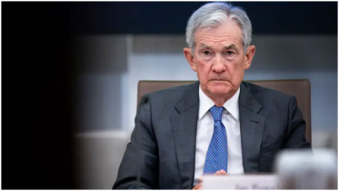 Federal Reserve holds rates, Powell defends independence