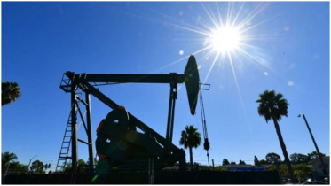 Oil slides on Iran deal optimism as stronger dollar rattles precious metals