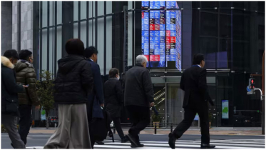 Stocks slip on mixed China data, drop in Wall St futures