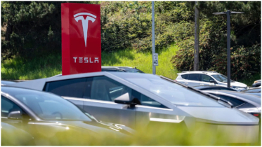 Tesla profit drops again as Musk warns of ‘Rough’ quarters ahead
