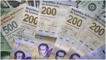 Dollar surges nearly fivefold in Venezuela amid inflation and sanctions