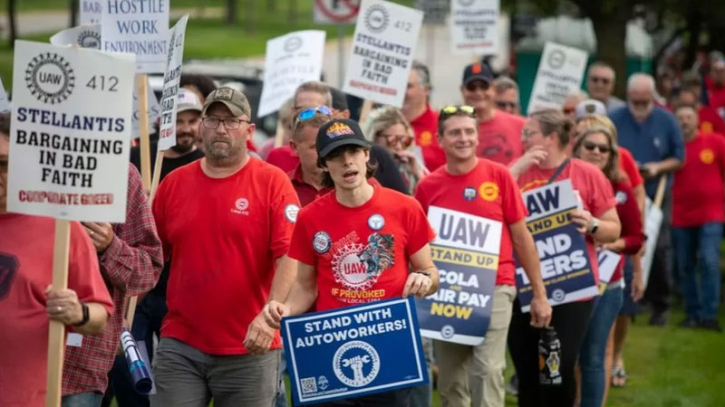 US car workers widen strike to dozens of sites US car workers widen strike to dozens of sites