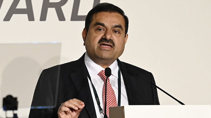 India's Adani firms lose $65bn in value