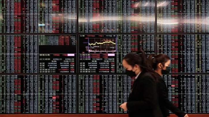 Asian shares mostly down ahead of Fed comments