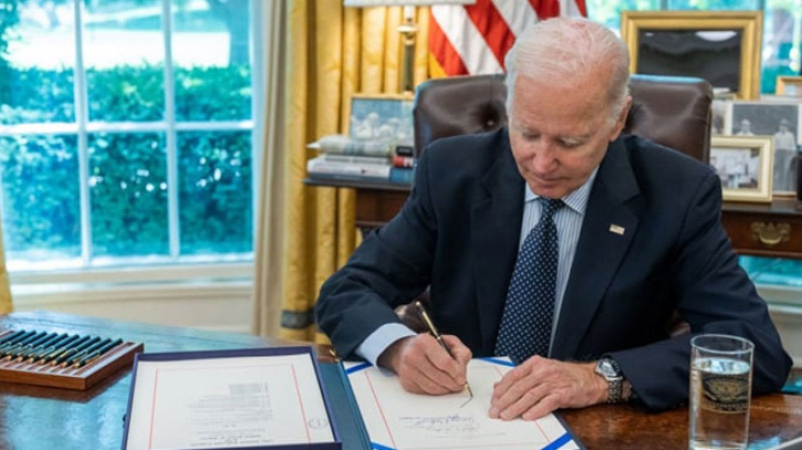 Biden signs debt ceiling bill into law, default averted