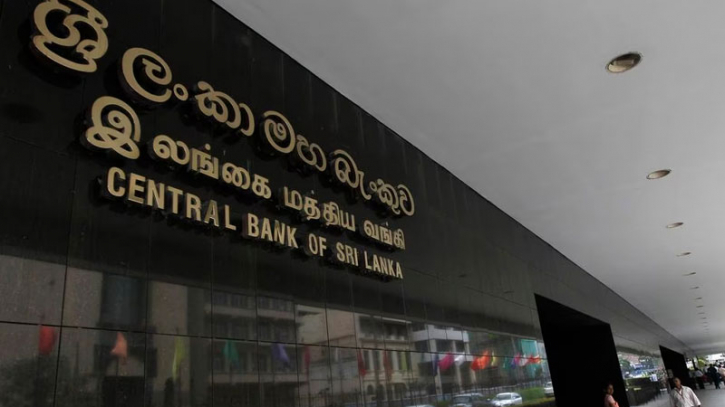 Sri Lanka cuts interest rates as IMF delays loan