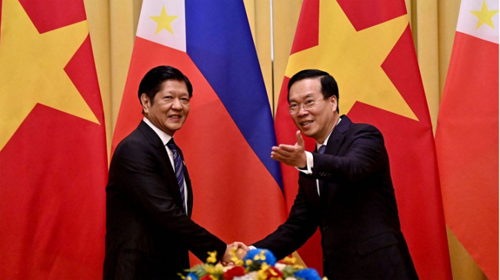 Vietnam, Philippines seal deals on South China Sea security, rice